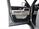  Inside of driver's side open door, window open photo